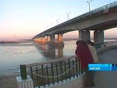 Река Сунгари в районе Харбина, кадр Первого канала Река Сунгари в районе Харбина, кадр Первого канала