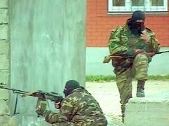 Бойцы федеральных сил. Кадр телеканала НТВ, архив Бойцы федеральных сил. Кадр телеканала НТВ, архив