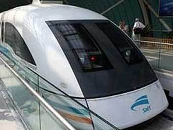 Китайский поезд на магнитной подвеске. Фото AFP Китайский поезд на магнитной подвеске. Фото AFP