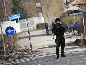 Полицейский ООН в Митровице. Фото ©AFP