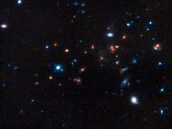   CL J1449+0856 ""  "".  NASA, ESA, R. Gobat (Laboratoire AIM-Paris-Saclay, CEA/DSM-CNRS Université Paris Diderot)