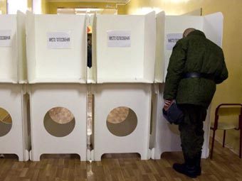 Голосование на парламентских выборах. Фото ©AFP
